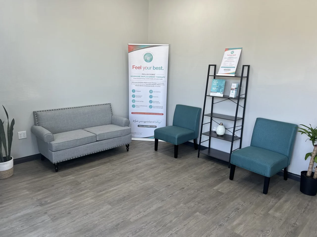 Modern wellness clinic waiting room with teal chairs